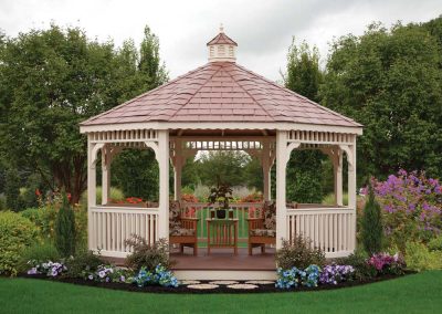 Almond Colored Gazebo Surrounded by Flowers