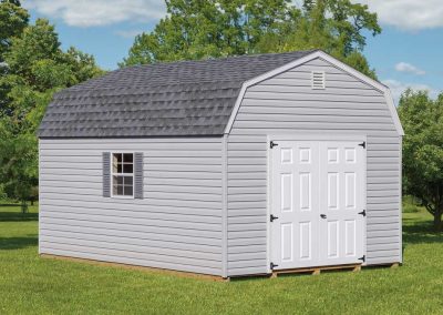 Gray Dutch Barn with White Doors